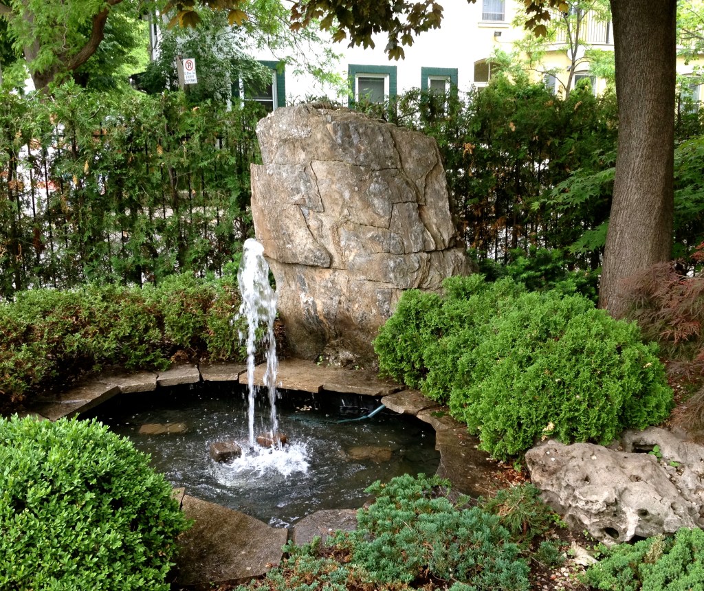 Fountain and rocks in front garden