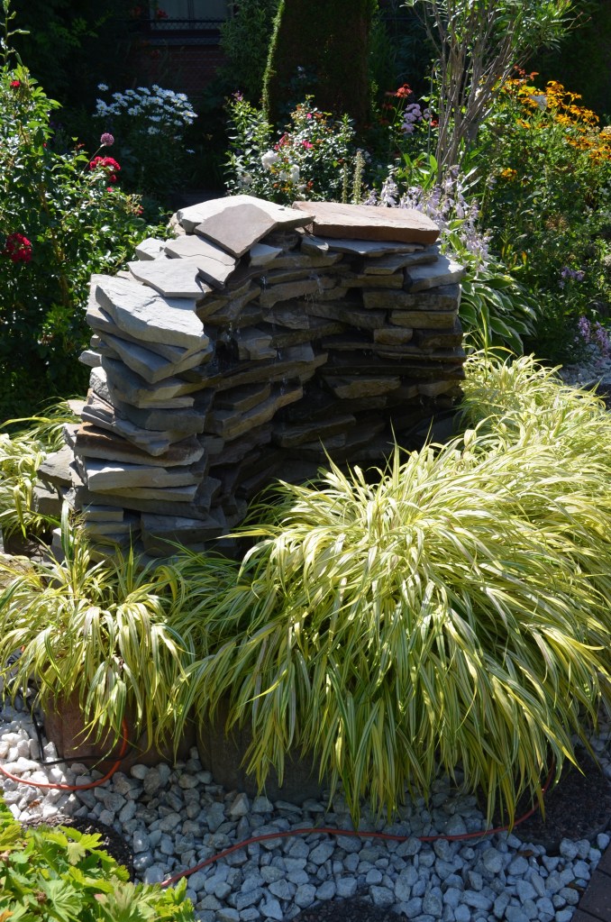 Water fountain and grasses