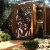 Entrance of a wooden circular pergola made of recycled wood.