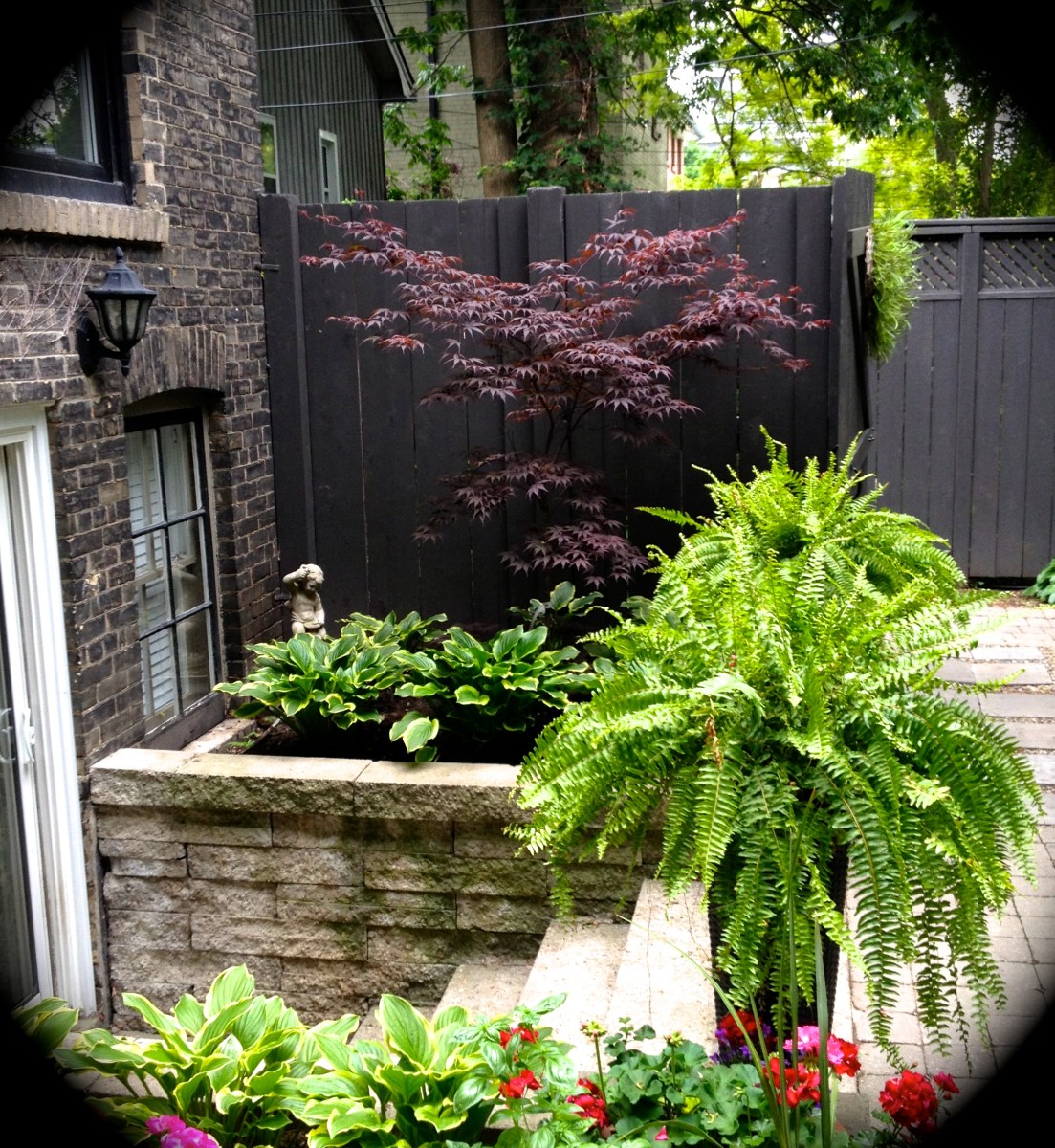 A raised bed used for ornamental plantings.