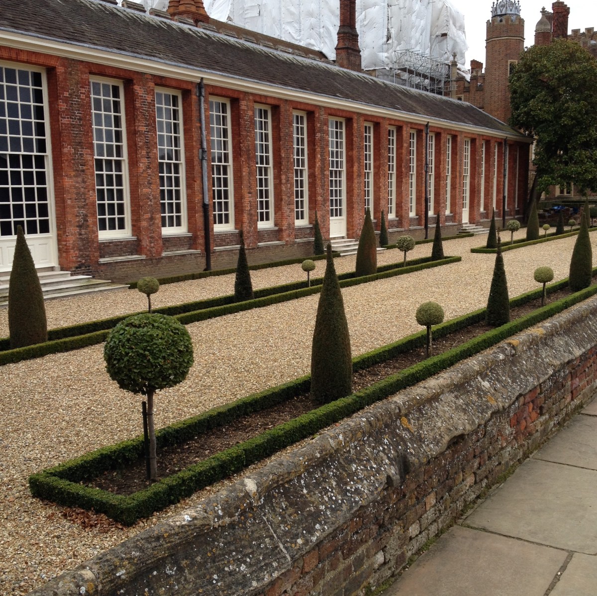 Hampton Court Palace garden with topiary.