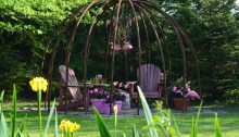 A garden seating area with a pink theme.