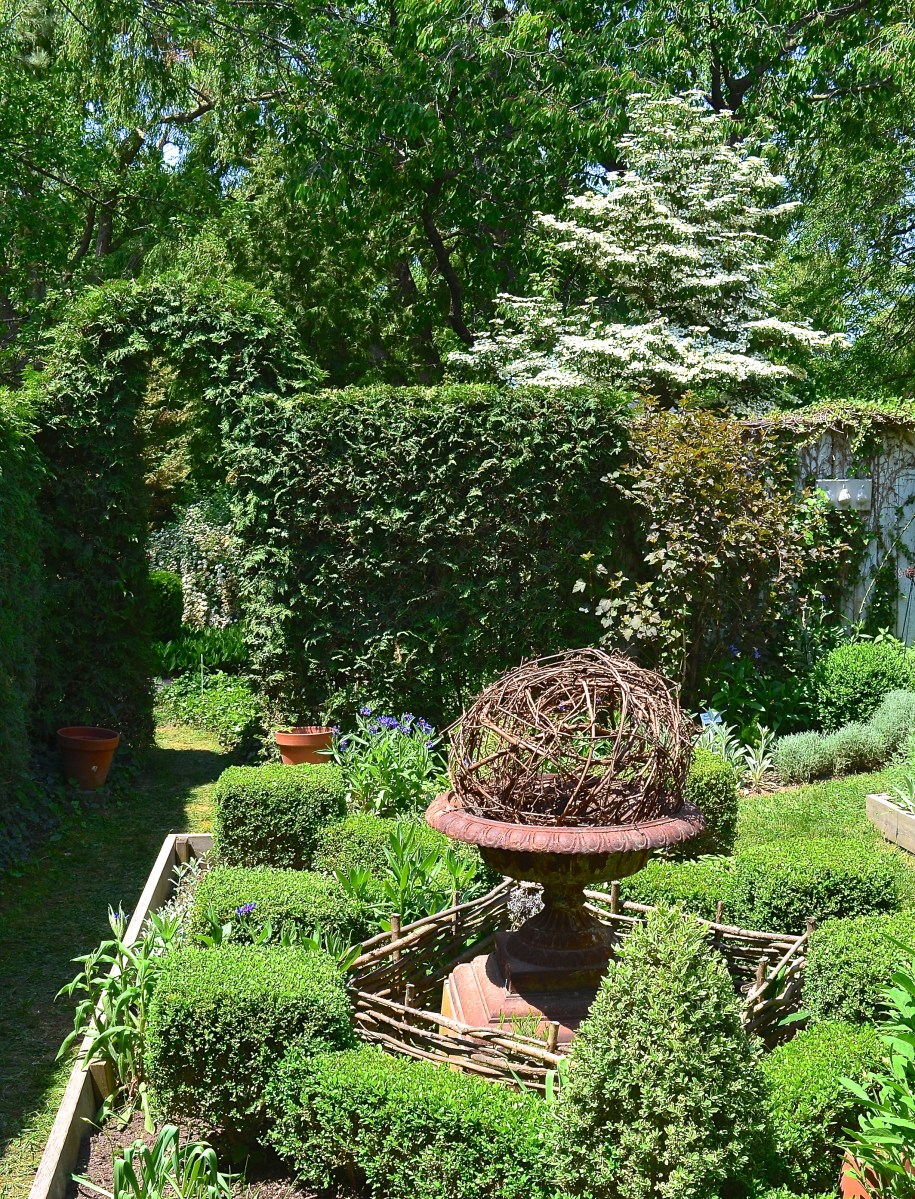 A secret garden has a formal look.