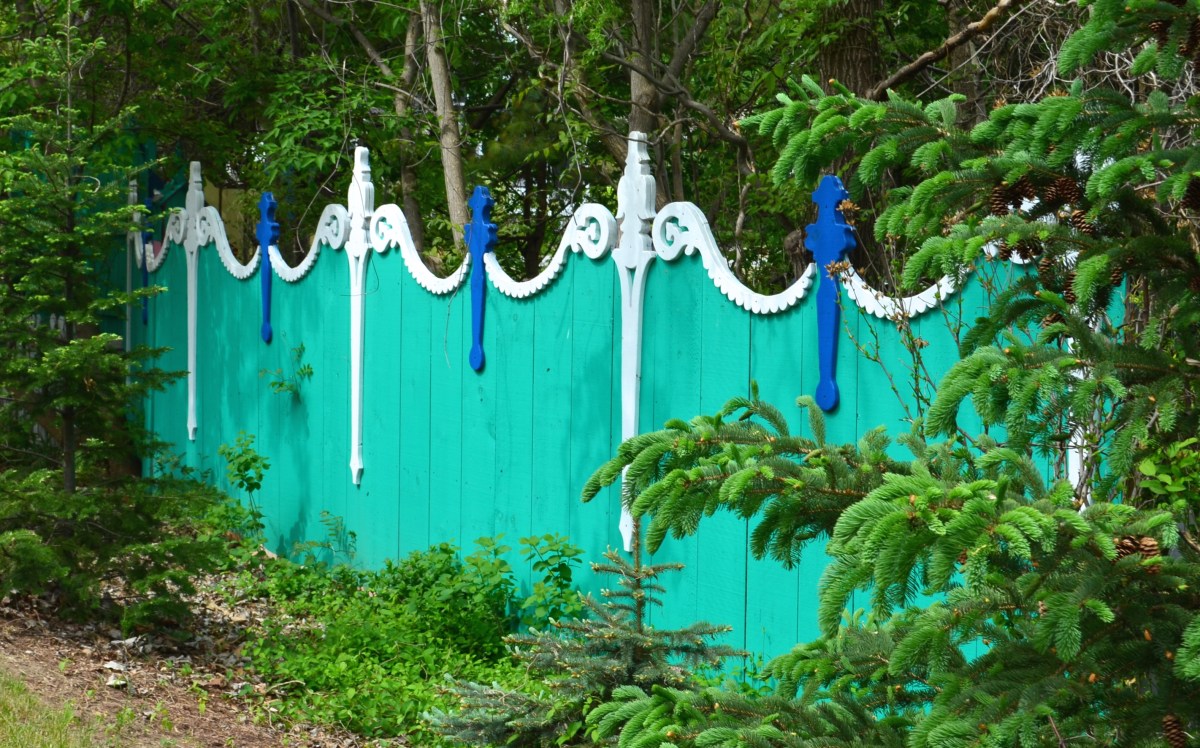 A funky fence with scroll work