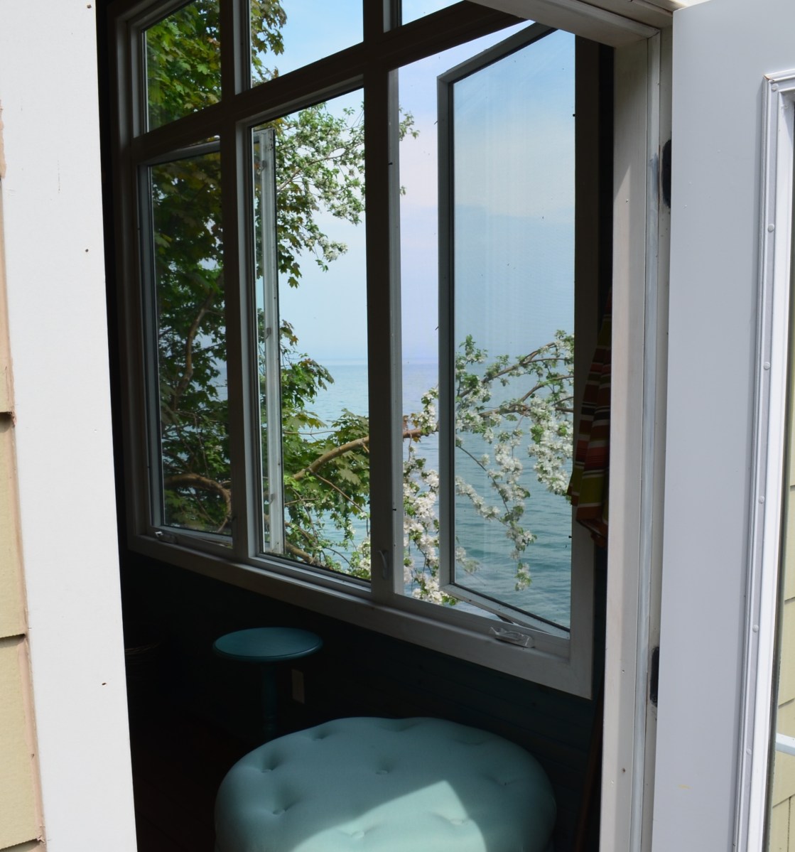 A view of the lake through the windows of the bunkie