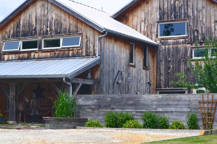 A ranch-style home with garden combining rustic touches and Asian garden styles