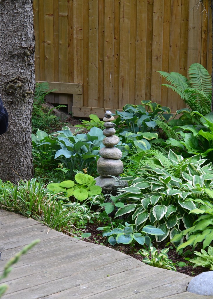 A stacked pile of stones becomes garden sculpture