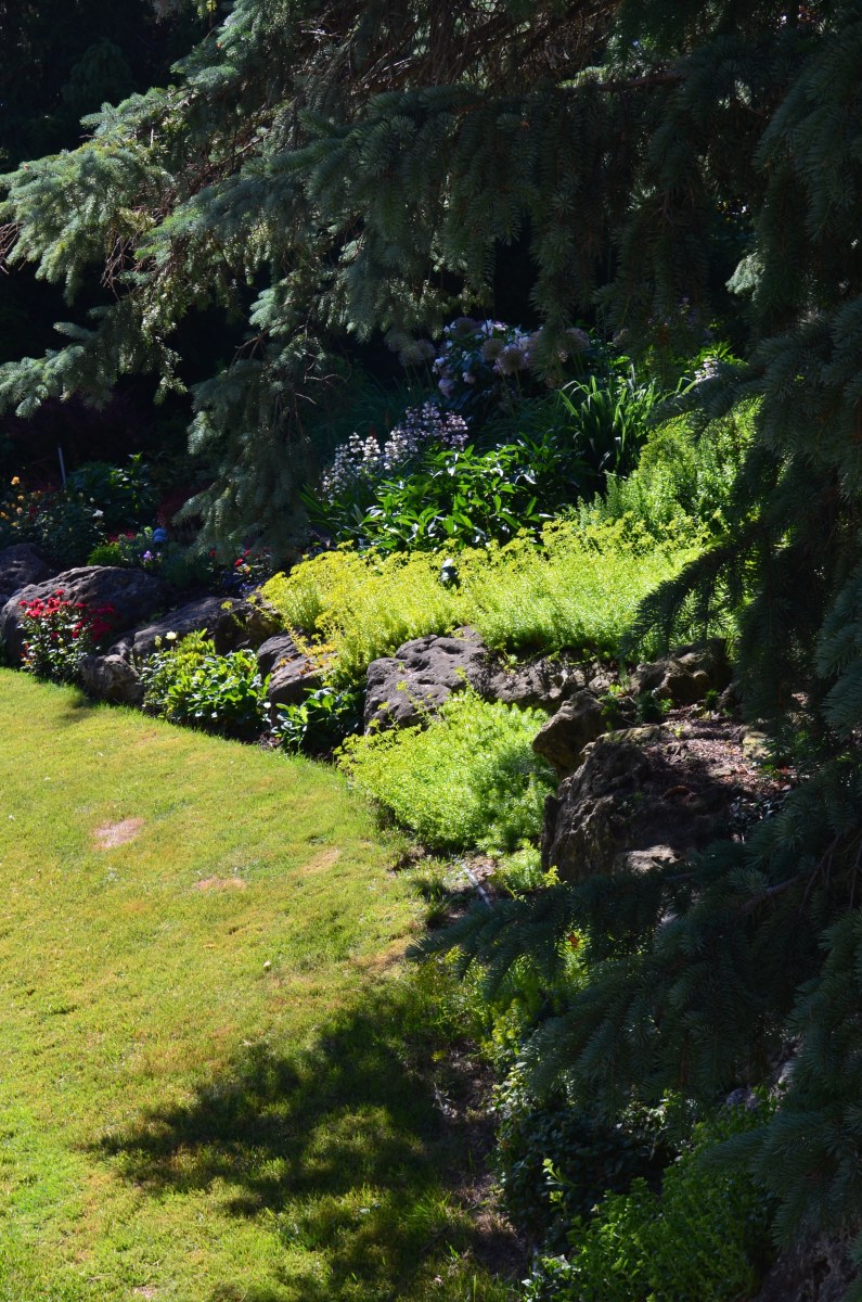 Rocks at the foot of a garden bed.