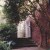 A doorway leads from one outdoor garden to another at Sissinghurst.