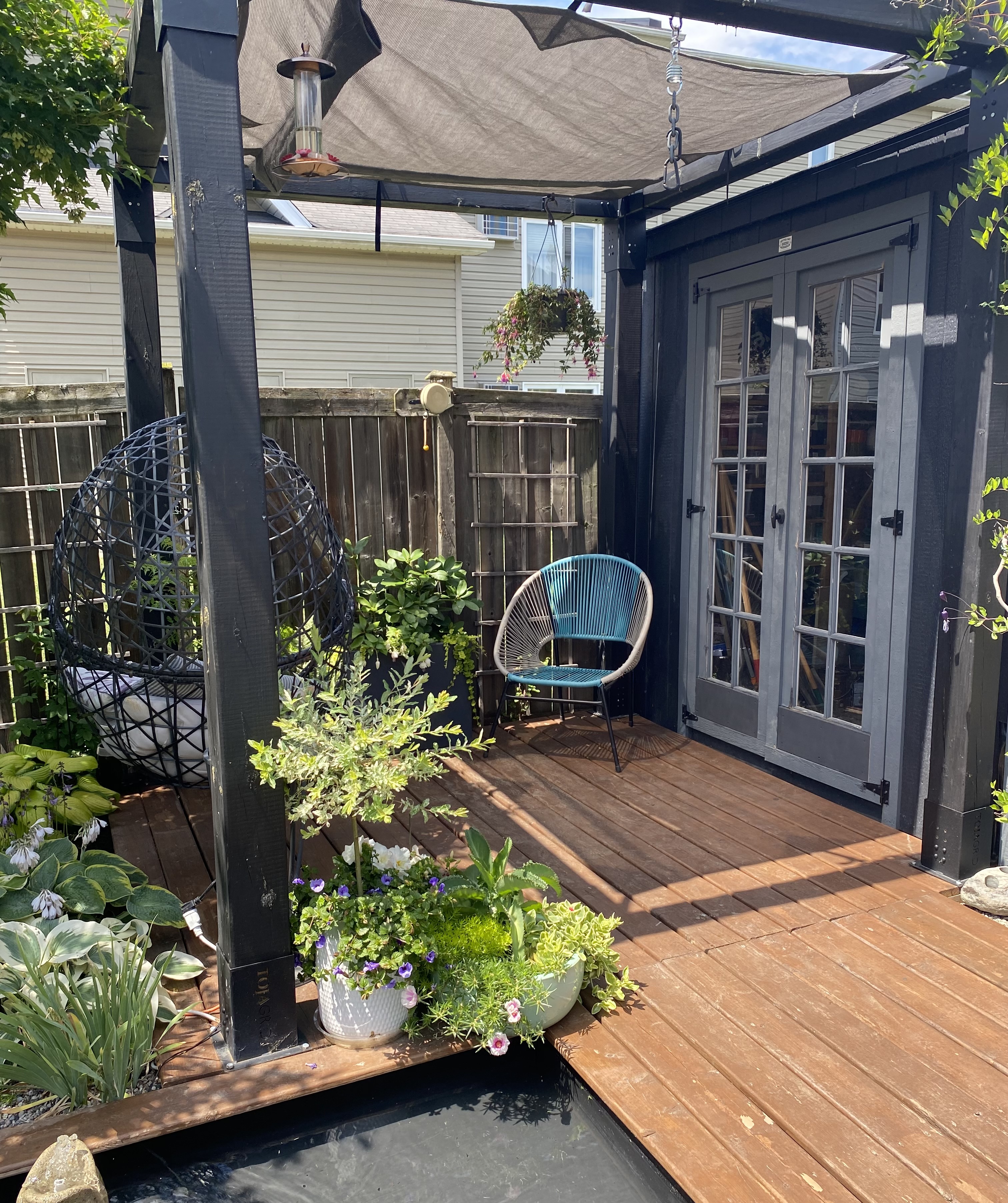 Small garden with seating and shed